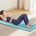 Aqua TPE exercise mat used for floor exercises at home