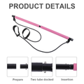 Pink Pilates bar with resistance tubes and foot loops, two-piece bar detail